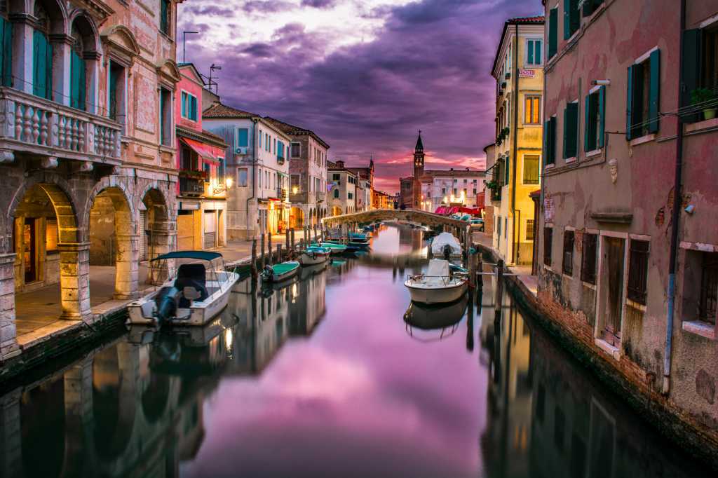 Metropolitan City of Venice, Italy - Venice canals in the evening light. 
