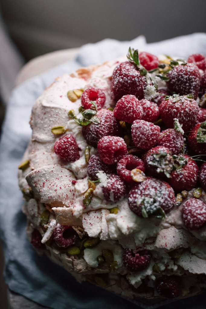 Raspberry cake with rosemary and powdered sugar