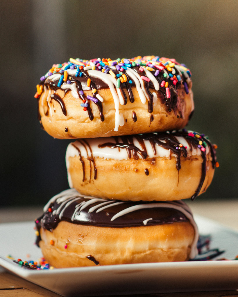 Stack of donuts with sprinkles